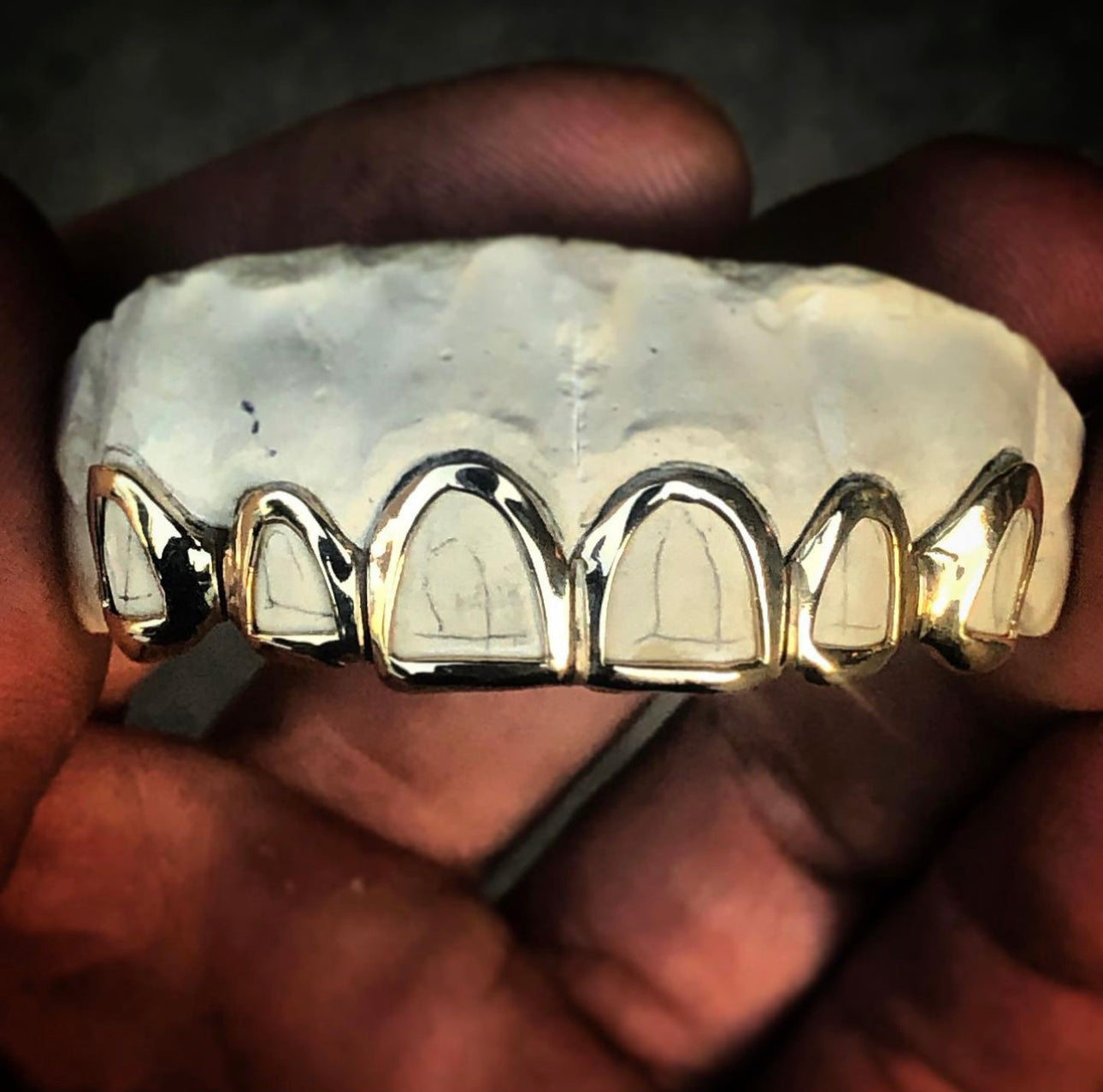 10 Karat Gold Grill + Design